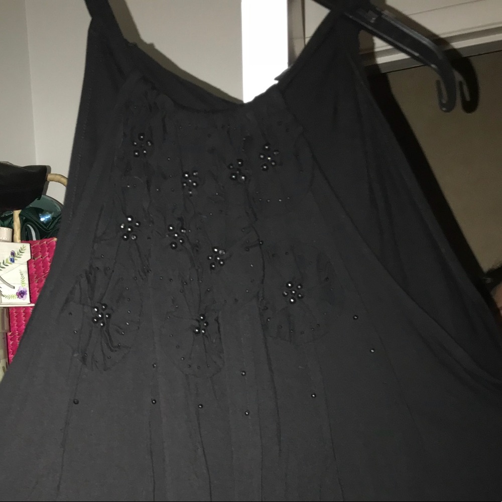 Plus size sleeveless dressy tank top.